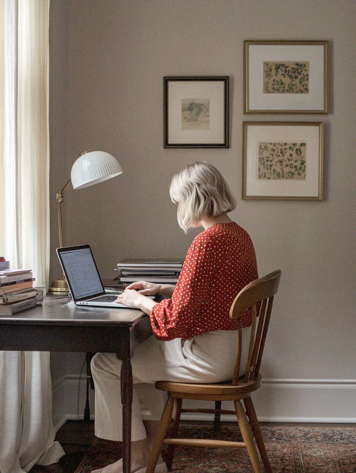 A customer deep in focus at their laptop